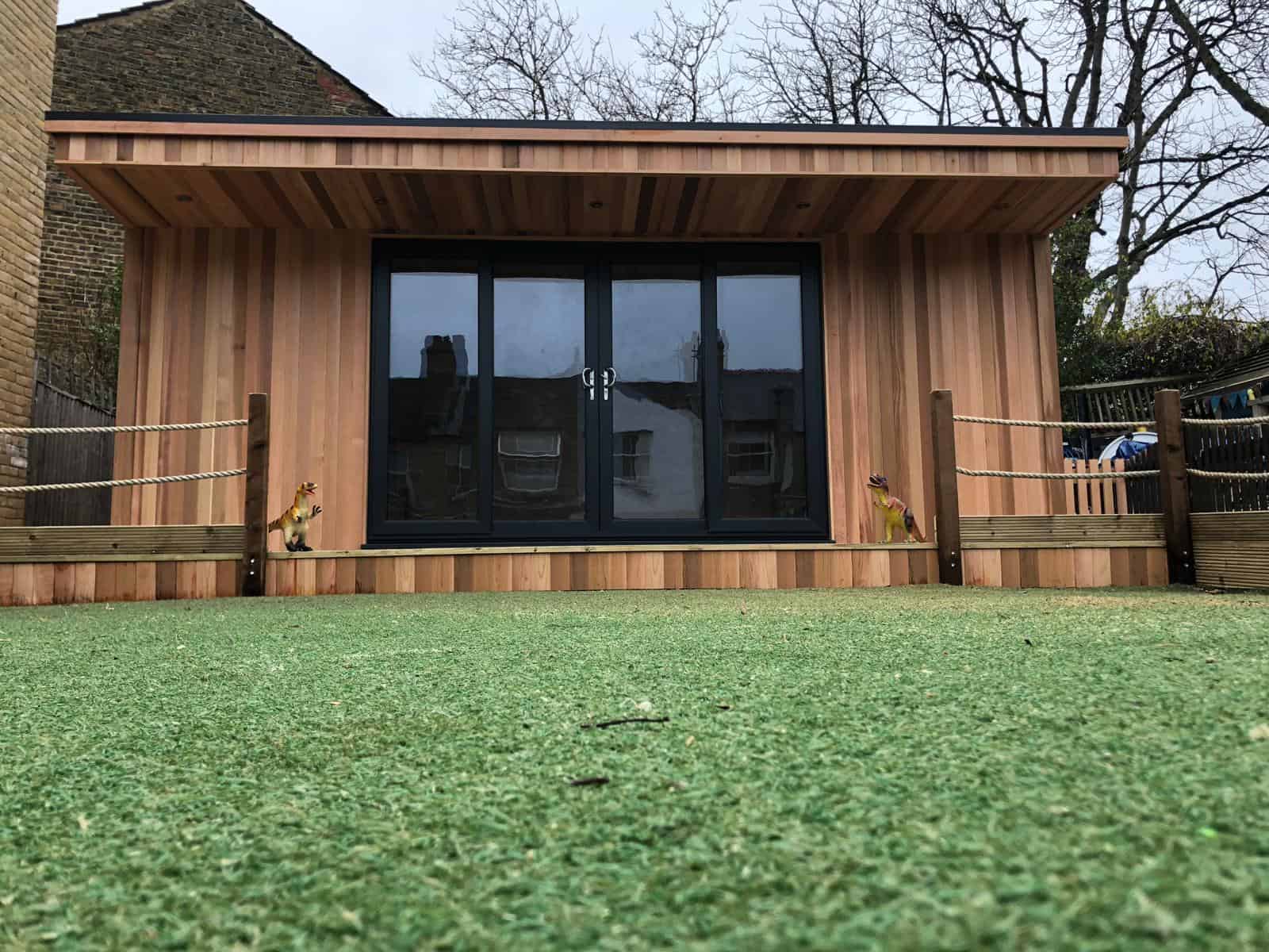 Summer House Designs: Canopy Room taken from floor level, featuring sliding patio doors and a decking with a rope barrier.